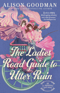 The cover of The Ladies Road Guide to Utter Ruin shows two women with elaborate costumes billowing as they ride in an open carriage with pink and purple colors dominating.