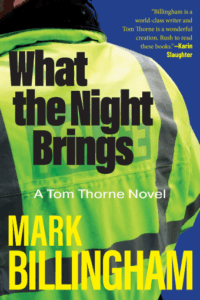 Cover of What the Night Brings shows the back of a British police officer in a hi-vis vest.