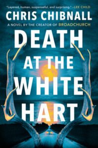 Cover of Death at the White Hart shows a road at night with a car approaching, seen through a pair of deer's antlers