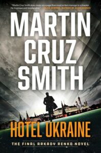 Cover of Hotel Ukraine shows a man from the back walking toward the Kremlin under a gray sky, the image tilted to one side.