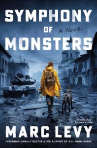 Cover of Symphony of Monsters shows a girl in a yellow raincoat and a dog walking down a gray street lined with war-torn buildings and a wrecked tank.