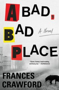 Cover of A Bad, Bad Place shows the title in large letter blocks over a photo of a rail line and a black dog.
