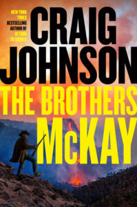 Cover of The Brothers McKay shows a man with a rifle standing on a mountain with a fire in the valley below, the sky a smoky red color.