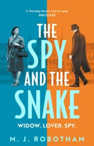 Cover of The Spy and the Snake shows two figures, a woman dressed for travel against a blue background and a man in a hat and long coat against an orange background.
