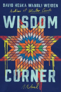Cover of Wisdom Corner shows an indigenous eight-point star pattern in colors of red, orange, yellow, and blue, with the color in some places appearing to run or come unraveled.
